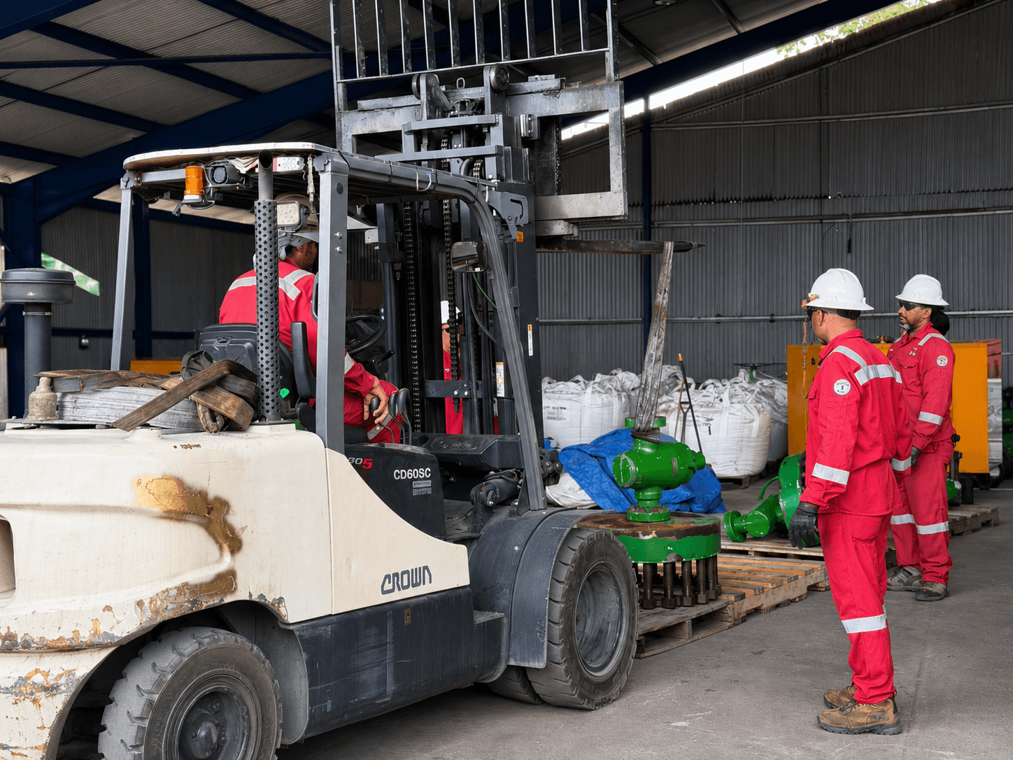 GMS crew coordinating industrial equipment movement